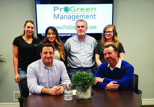 The ProGreen Management LLC team includes (seated from left) Owners Paul Procaccini and David Greenberg and (standing from left) Manager Cassandra Roman, Service Representative Shaienne Kamlet, Sales Manager Les Korsos and Service Representative Melina Abrams.